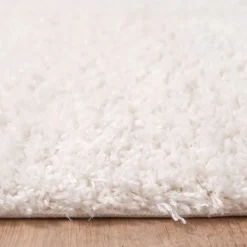 Unamourdetapis Tapis shaggy tissé motif uni LYN4 UNILA, crème* Tapis Uni